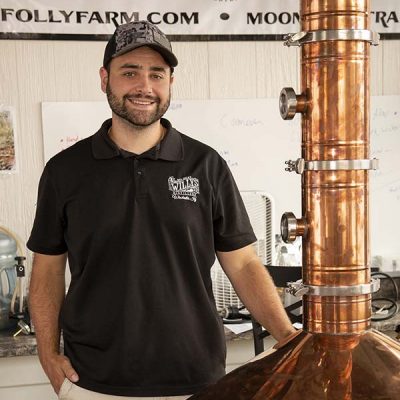 Zach and his Still at Wildcat Willy's Distillery