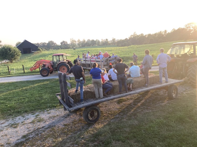 farm tour wagons circled to listen